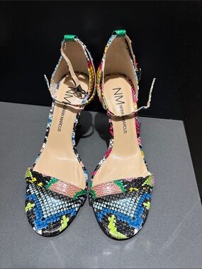 Neiman Marcus snakeskin multi colored heels in a size 61/2M